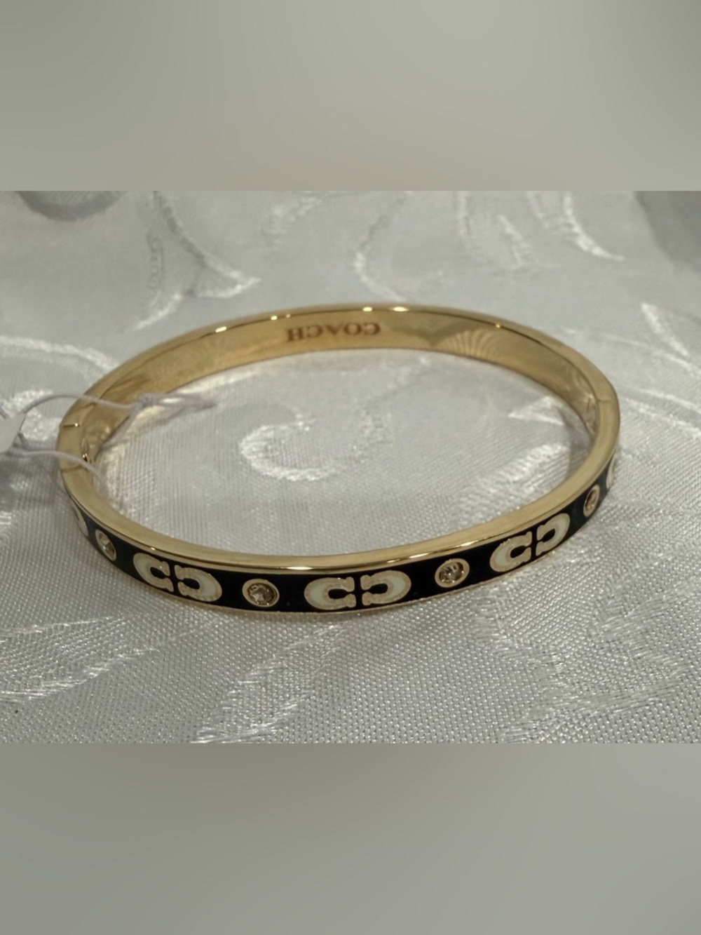 Coach Gold-Tone Bracelet with Black and White Enamel and Crystal - Picture 4 of 6